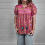 Woman wearing jeanie top floral 