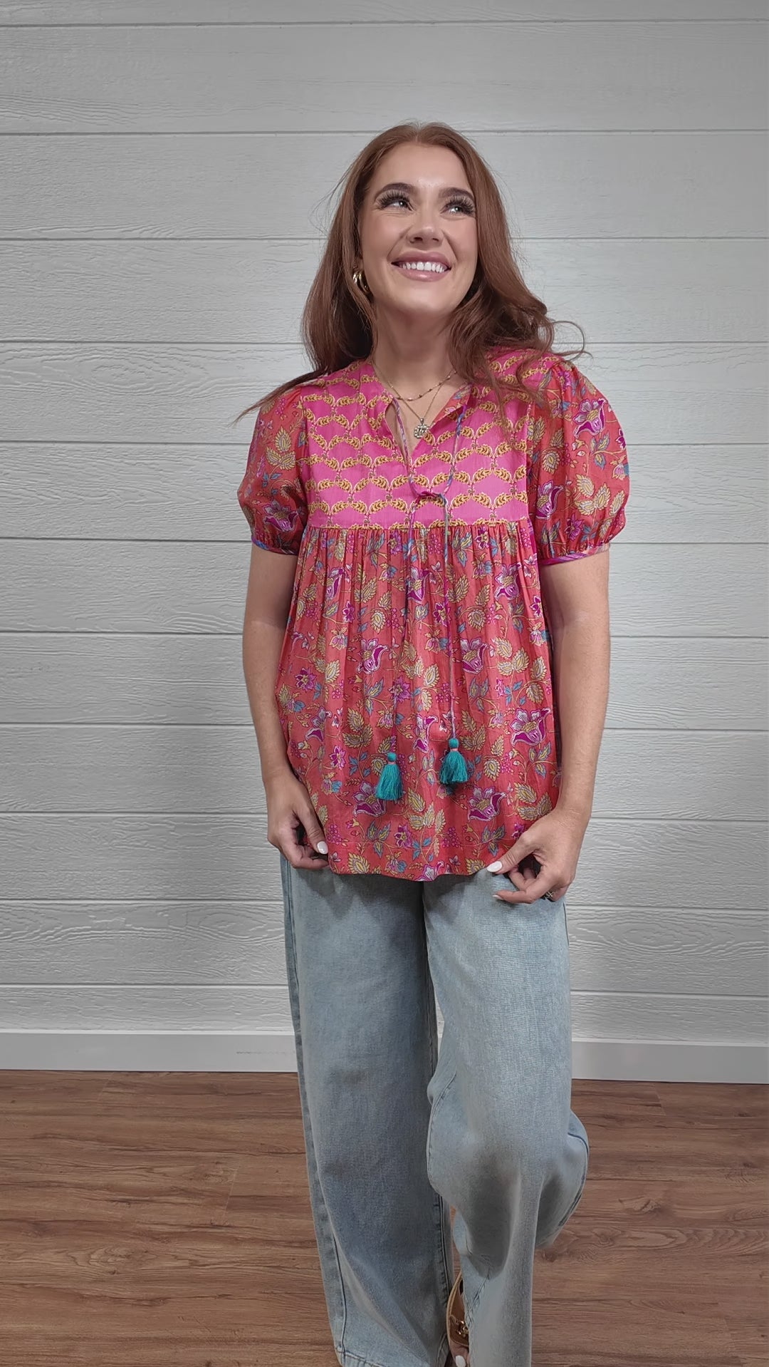 Woman wearing jeanie top floral 