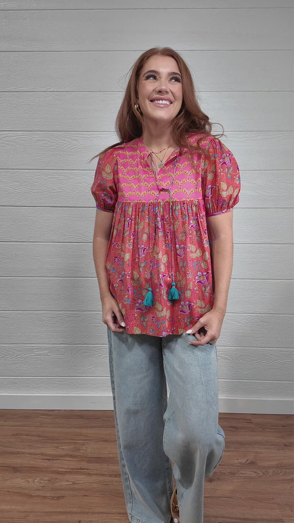 Woman wearing jeanie top floral 